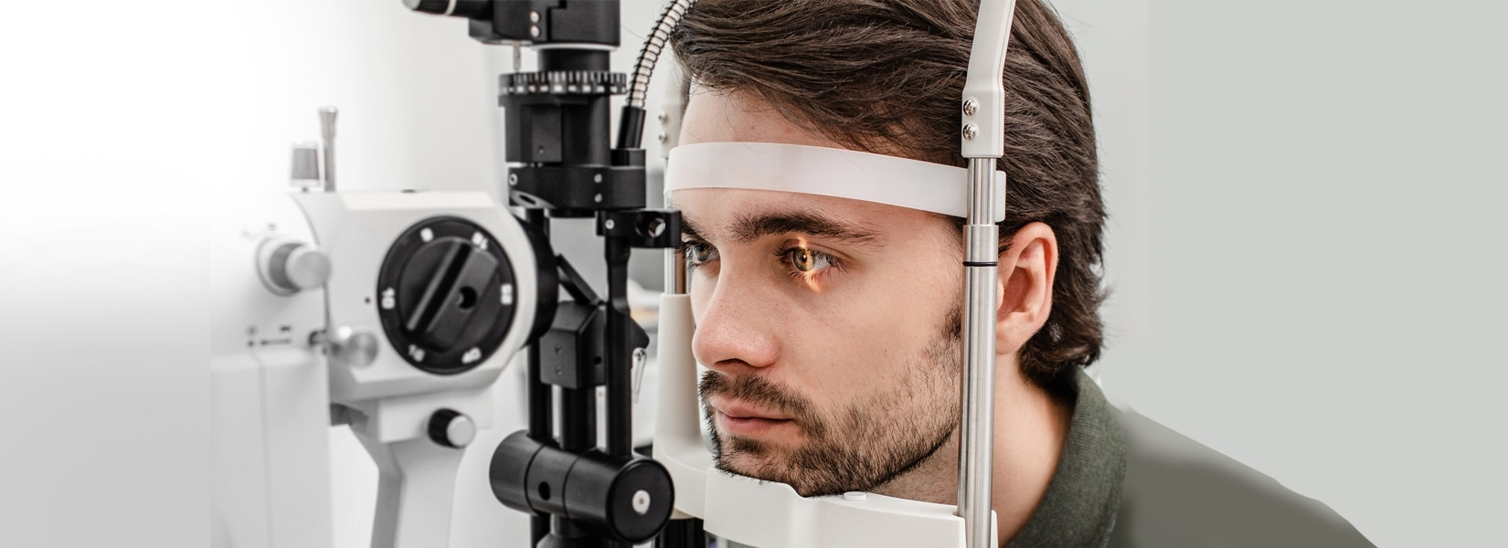 young man during eye exam in St. Louis